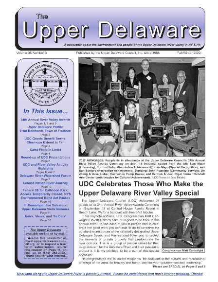 cover of the Fall-Winter newsletter featuring our award winners displaying their plaques