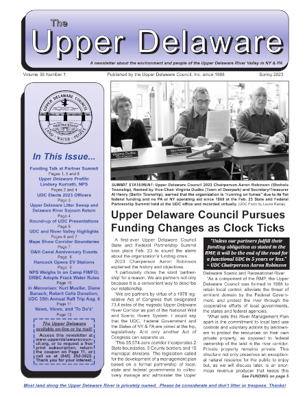 Cover of the Spring 2023 "The Upper Delaware" Newsletter, featuring a photo of UDC officers looking grim